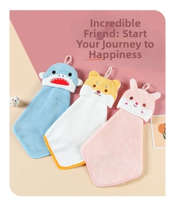 Close-up of cute coral fleece animal hand towels with hanging loops in three designs