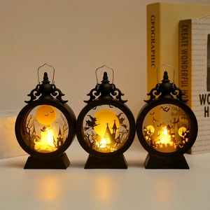 Halloween decorative LED lanterns with pumpkin, witch, and bat silhouettes in warm light