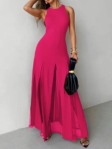 Elegant sleeveless hot pink maxi dress with high slit and waist-cinching silhouette
