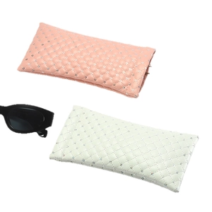 Chic quilted PU leather sunglass pouches in pink and white with rhinestone accents