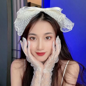 French style white polka dot mesh bow headband and sequin lace gloves set on model