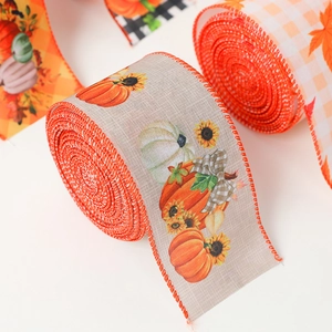 Autumn burlap ribbon rolls with printed pumpkins, sunflowers, and orange maple leaf patterns