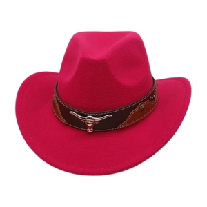 Detail of rose red wool cowboy hat featuring a leather band with silver bull head ornament