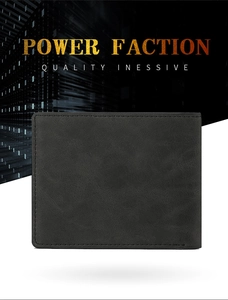 Detailed close-up of premium black leather wallet with neat stitching and fine texture