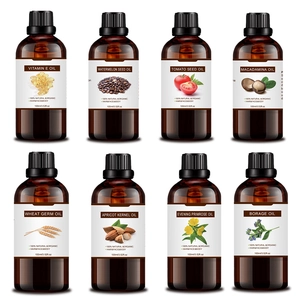 Detailed set of 100ml amber glass essential oil bottles with black pipettes for hair and face
