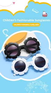 Detail of round flower-shaped children's sunglasses with matte finish in black and white