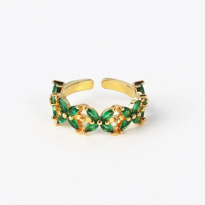 Detail of gold-plated open ring featuring green marquise-cut marquise-cut stones