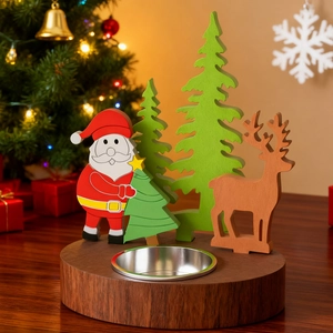 Detailed view of DIY Christmas tree resin candle holder with Santa and reindeer decor