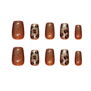Caramel cat eye press-on nails set with leopard patterns and glitter in long coffin shape