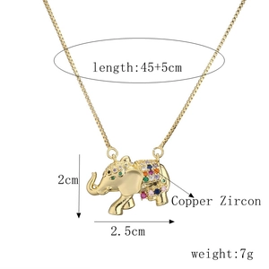 Detailed view of gold elephant pendant with colorful cubic zirconia and dimensions