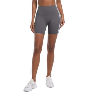 Close-up of high-waist grey yoga shorts featuring double white side stripes and stretch fabric