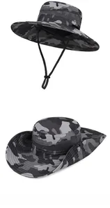 Macro view of camouflage sun hat featuring breathable mesh panel and adjustable chin strap
