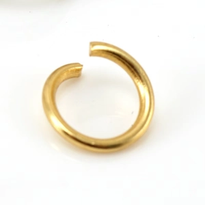 Close-up of a 18K gold-plated stainless steel open jump ring for DIY jewelry making