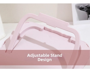 Detail of adjustable white bracket on the back of a pink cartoon portable vanity mirror