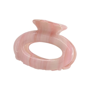 Elegant pink acetate claw clip with marble patterns for high ponytail hair styling