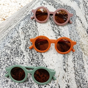 Chic round frame matte kids sunglasses in dusty pink, bright orange and bean green