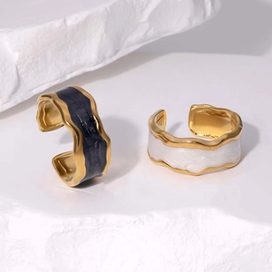 Minimalist gold-plated wave rings with black and white drip oil enamel on stone base