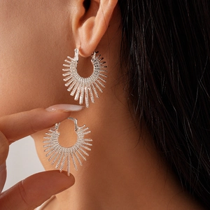 Silver sunburst fireworks earrings with metallic hollow design for women's fashion