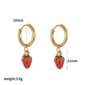 Detail view of gold hoop earrings with red strawberry charms including size and weight specs