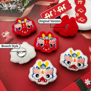 Plush Chinese New Year dragon brooch and ornament with intricate embroidery and pins