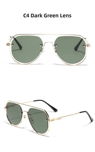 Detail view of gold aviator sunglasses with dark green lenses and hollow metal rivet design