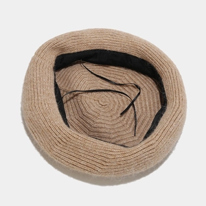 Women's knitted wool beret in beige with adjustable inner strap for winter warmth