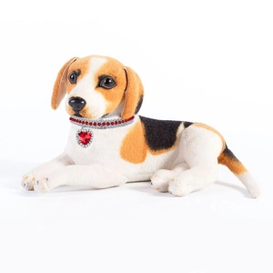 Close-up of a beagle plush wearing a red rhinestone pet collar with a heart pendant