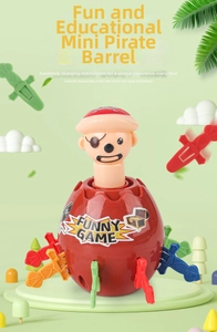 Detailed close-up of pirate barrel toy with colorful swords and funny pirate figurine