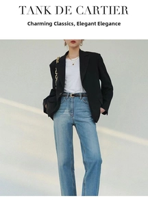 Minimalist black thin belt detail, stylish metallic buckle for jeans and dress styling.