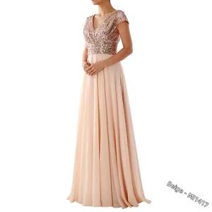 Detail of elegant V-neck champagne sequins and flowy beige chiffon evening gown dress