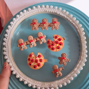 Cute gingerbread man and pizza hair clips with resin details on metal snap bases