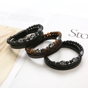 Three-piece set of men's multilayer skull bracelets with natural stone and braided leather
