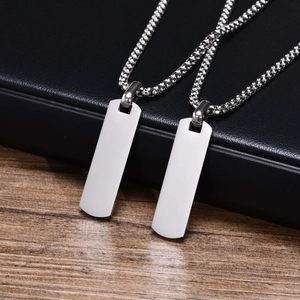 Minimalist stainless steel rectangle tag necklaces in silver finish, diagonal top view