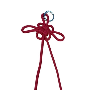 Handmade red woven Chinese knot accessory with silver metal spring ring fastener