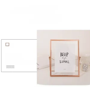 Detail of rose gold 5x7 metal photo frame with adjustable glass panel and minimalist trim