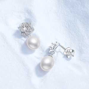 Elegant S925 sterling silver camellia earrings with natural freshwater pearls and moissanite