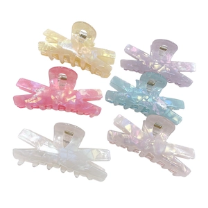 Set of six colorful 9cm holographic acrylic hair claws with glossy jelly finish and 8 teeth