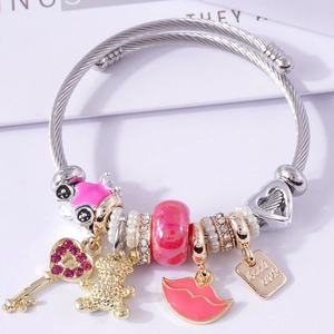 Bracciale argento a corda con corona rosa, chiave a cuore e ciondolo Good Luck