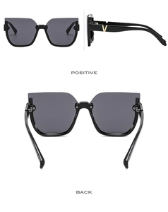 Detailed views of cat-eye sunglasses featuring golden V-shaped metal temple decor
