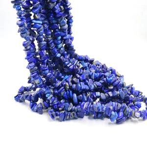 Close-up of natural blue lapis lazuli stone beads for handmade jewelry making