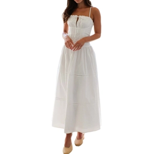Elegant white spaghetti strap tiered maxi dress with button details for summer vacation