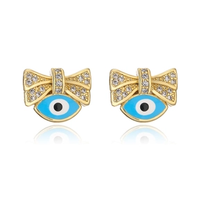 Detail of 18K gold-plated bow earrings with blue evil eye zircon charms and rhinestones
