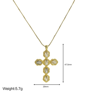 18k gold plated cross necklace with zircon pendants and size dimensions on white backdrop
