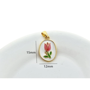 Silver-plated daisy pendant with colorful zircon stones measuring 15mm by 12mm