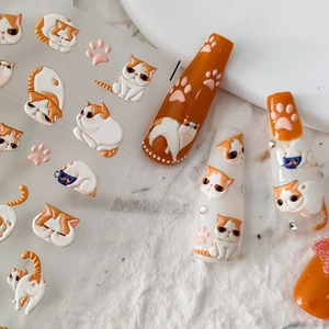 3D embossed cartoon cat nail art stickers featuring cute paw prints on polished nails