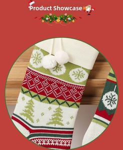 Detailed knit Christmas stocking featuring festive snowflake and tree patterns with white pom-poms