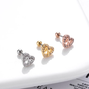 Three heart-shaped stainless steel ear studs with zircon bow in gold, silver, and rose gold
