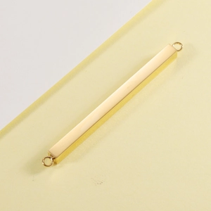 Detailed view of golden mirror-finish stainless steel bar with loops for DIY jewelry making