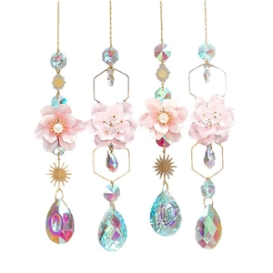 Pink floral crystal suncatchers with golden chains and iridescent teardrop pendants
