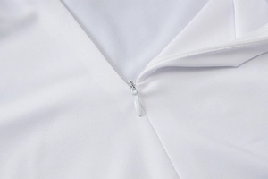 Detailed close-up showing the seamless invisible zipper on a white athletic bodysuit
